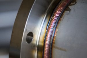 Rainbow Steel Weld Joining Pipe to Plate